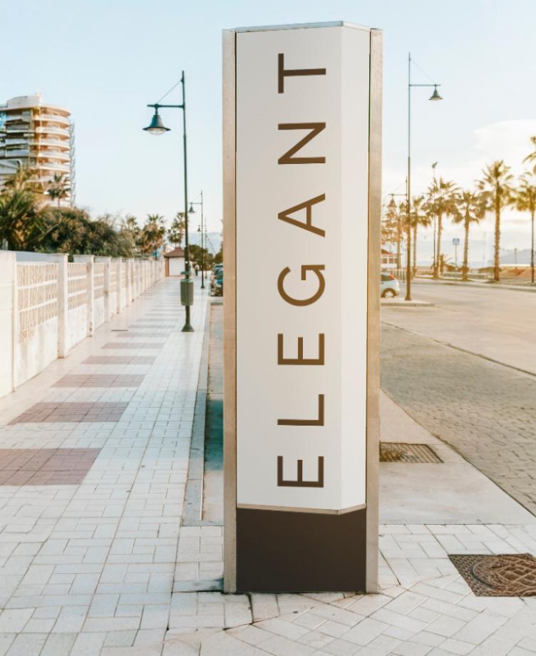 Nowoczesny pylon reklamowy z logotypem firmy, zamontowany przed budynkiem biurowym.